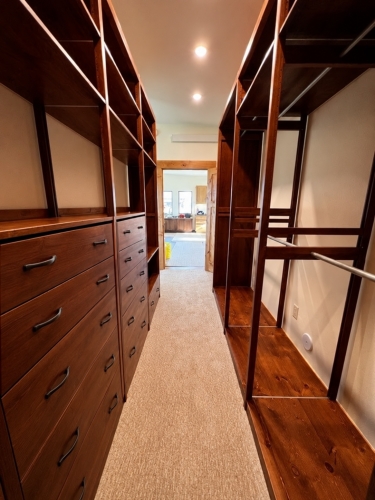 Customer photo of a Lundia closet in our Cherry finish