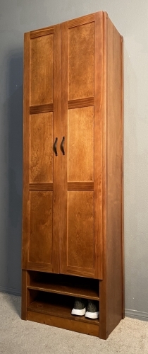 Customer photo of a Lundia closet in our Pecan finish