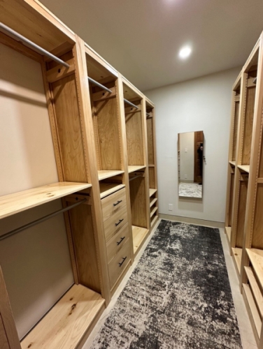 An 83-inch solid wood reach-in closet system